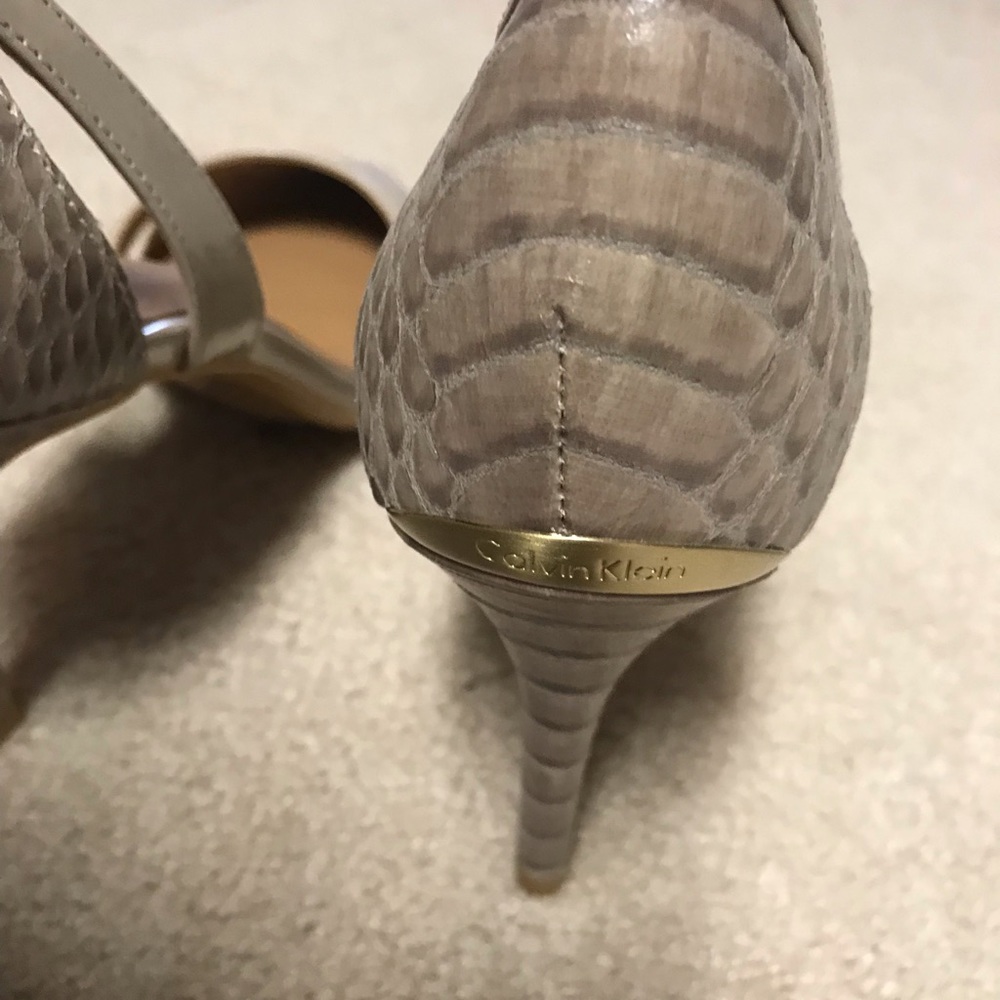 Calvin Klein nude snakeskin pumps